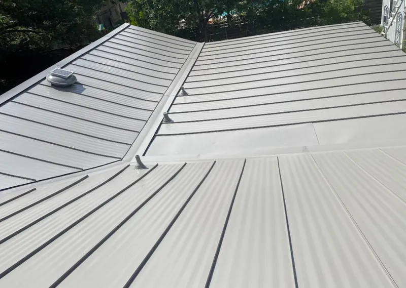 Solar attic fan installed on a metal roof for Roof Ventilation in Royal Kunia